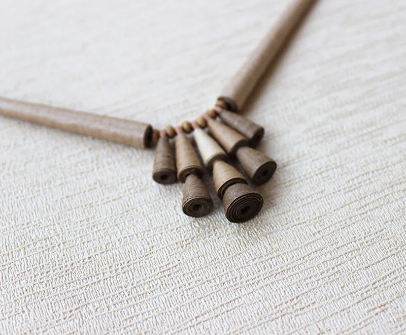 sustainable fashion necklace made from recycled paper