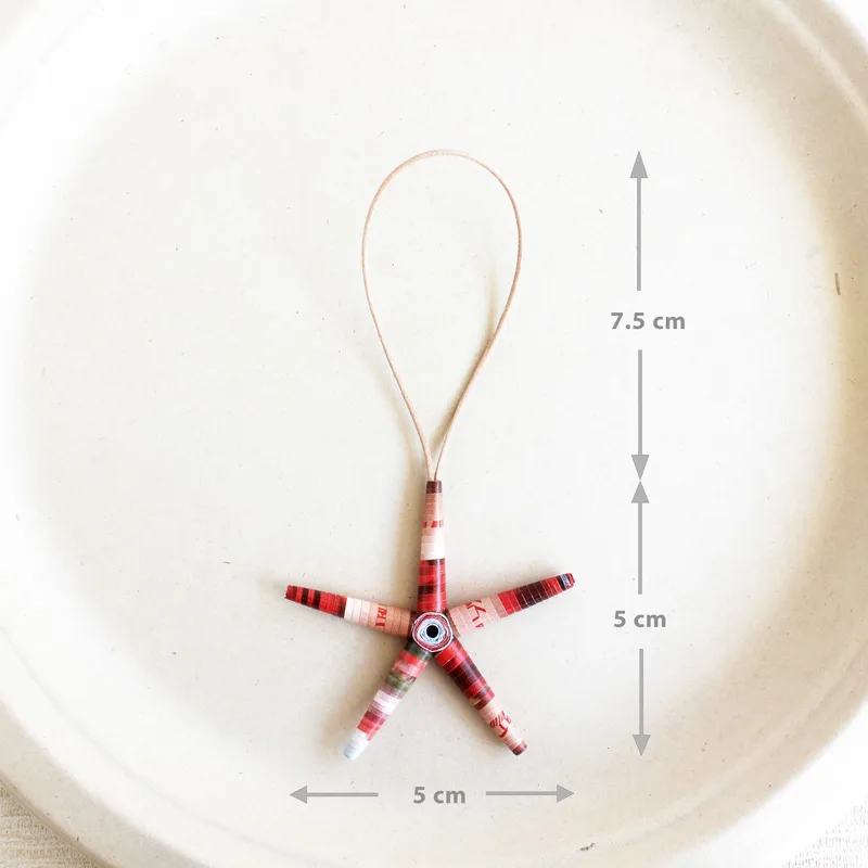 star ornament made from recycled magazines